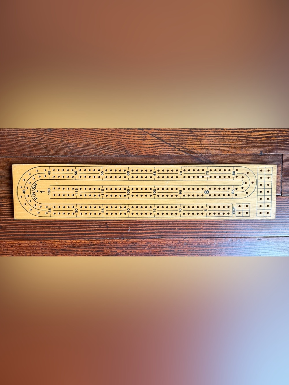 Wood cribbage board
